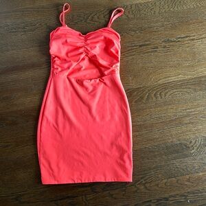 Katie J NYC neon orange mini dress with front cutout. Kids large. Like new.